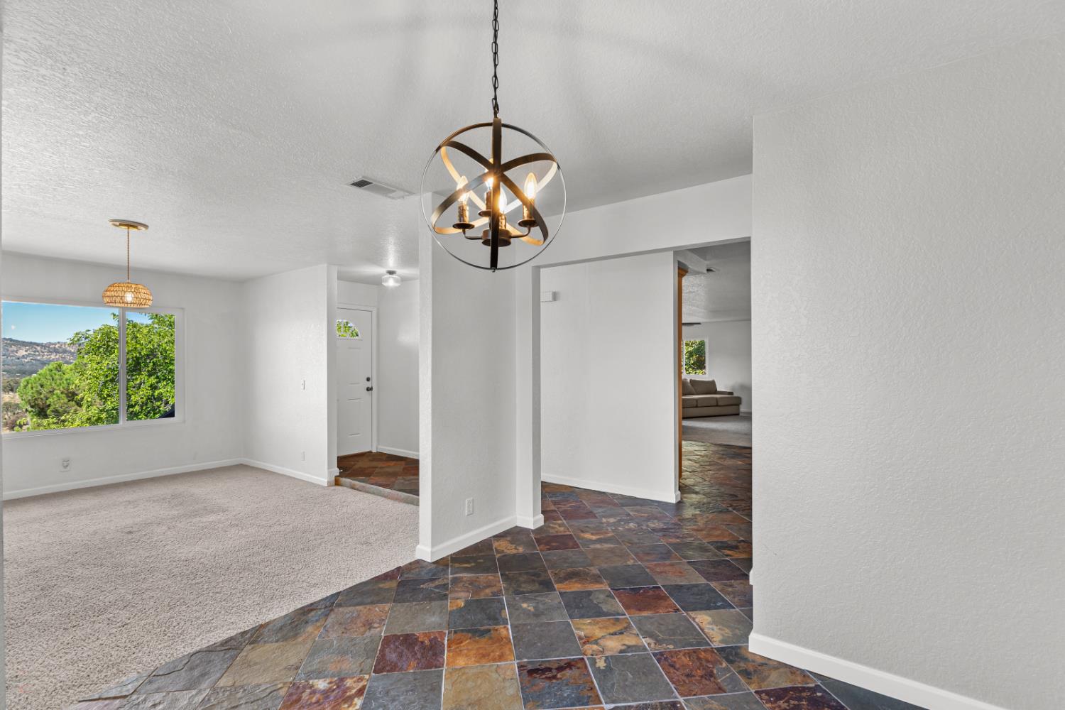 2512 Quail Hill Road Copperopolis, CA 95228 - Photo 24 of 70 a view of a hallway to a bedroom