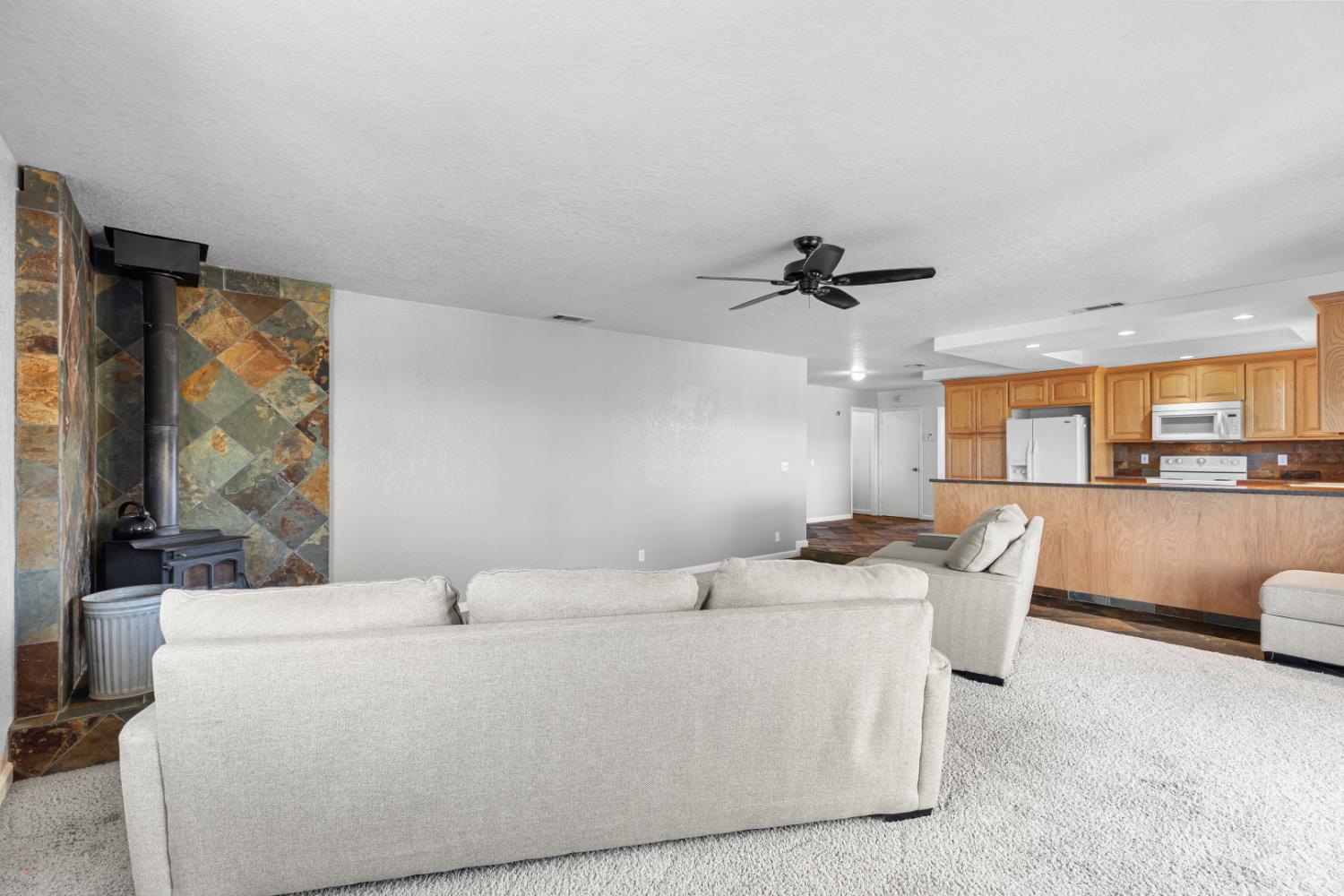 2512 Quail Hill Road Copperopolis, CA 95228 - Photo 34 of 70 a living room with furniture and a large window