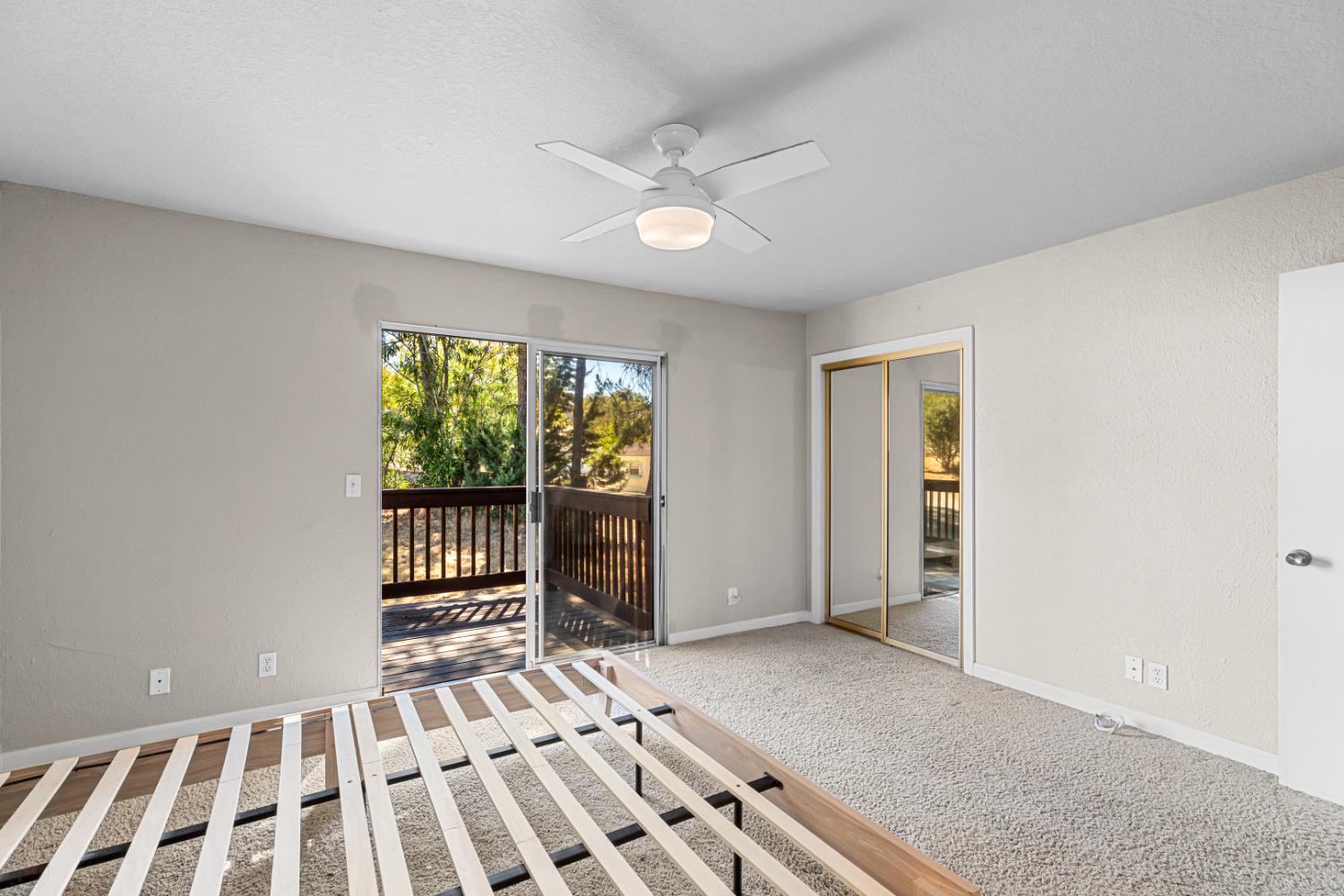 2512 Quail Hill Road Copperopolis, CA 95228 - Photo 42 of 70 wooden floor in an empty room with a window