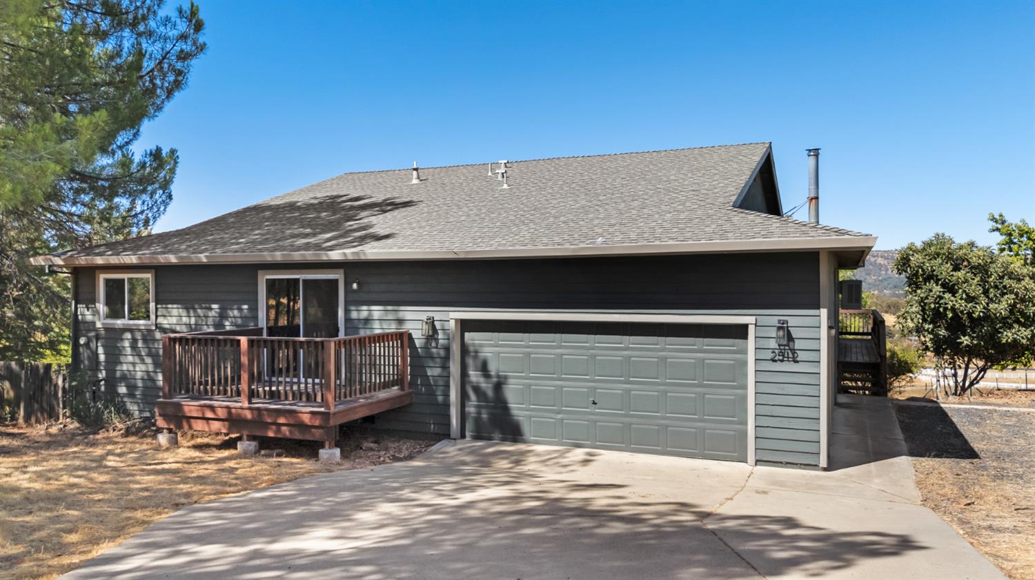 2512 Quail Hill Road Copperopolis, CA 95228 - Photo 5 of 70 a front view of a house with balcony