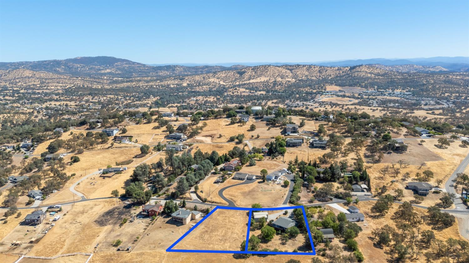 2512 Quail Hill Road Copperopolis, CA 95228 - Photo 62 of 70 an aerial view of residential houses with outdoor space and trees