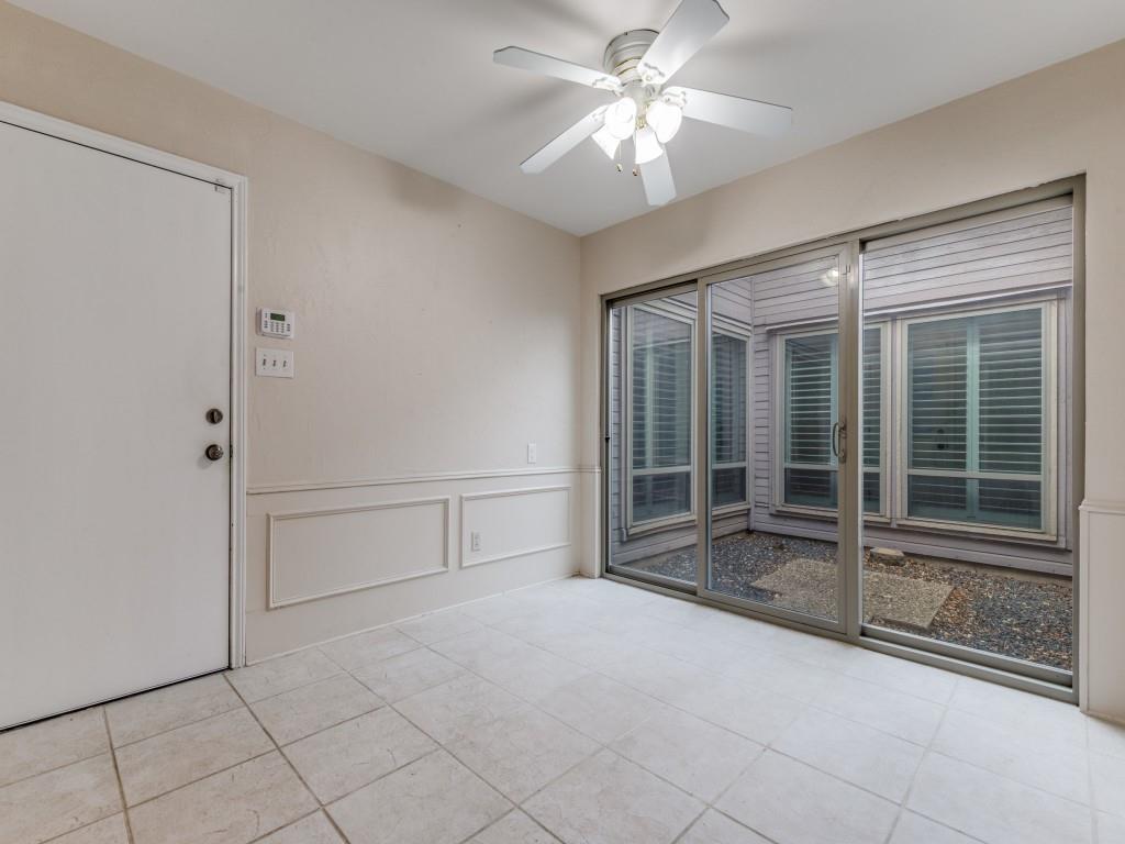 4020 Morman Lane Addison, TX 75001 - Photo 14 of 31 a view of a livingroom with a chandelier fan