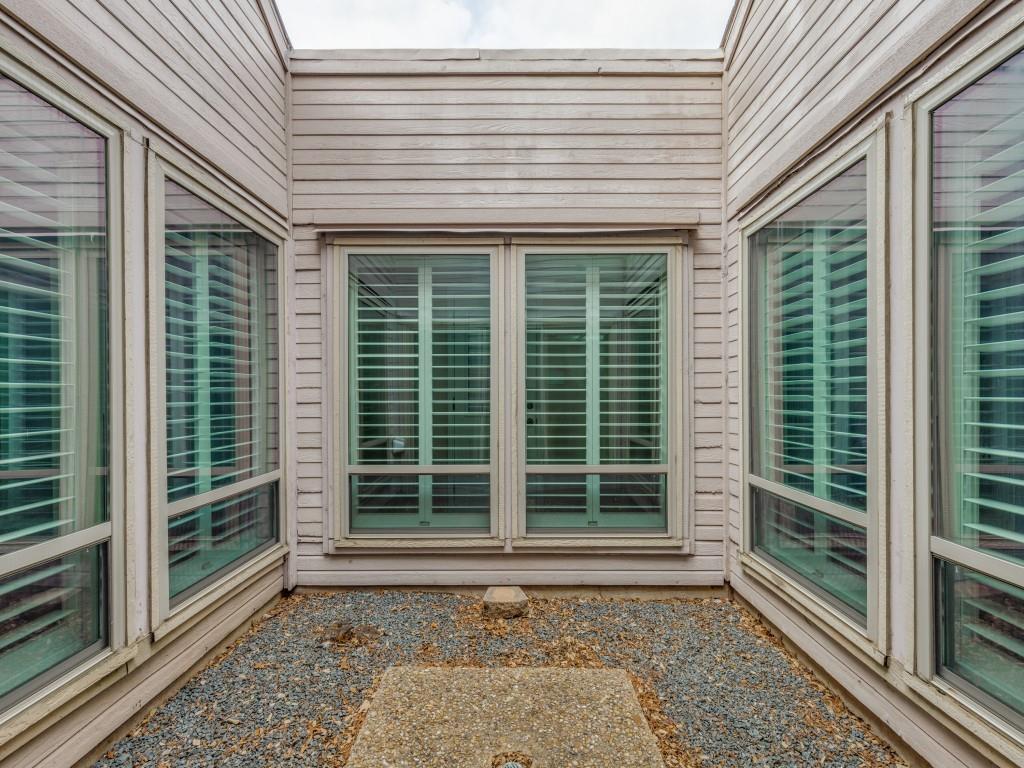 4020 Morman Lane Addison, TX 75001 - Photo 30 of 31 a view of a house with a large window