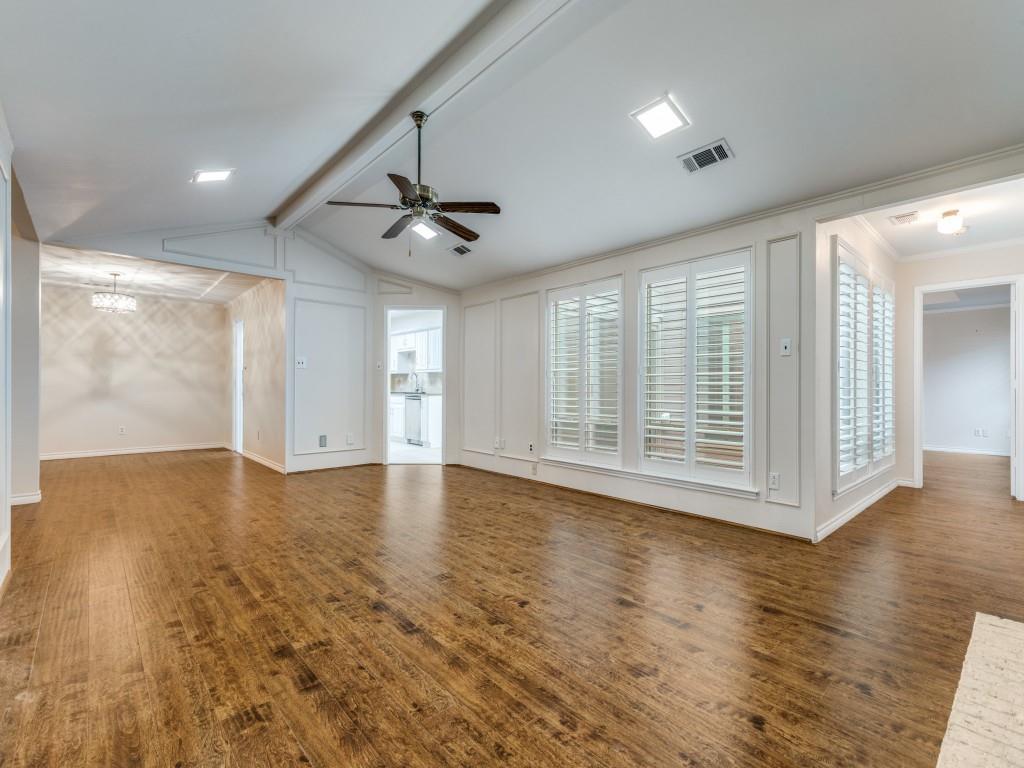 4020 Morman Lane Addison, TX 75001 - Photo 9 of 31 a view of an empty room with wooden floor and a window