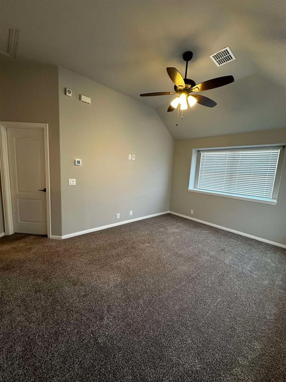 1217 Timber Grove Terrace Little Elm, TX 76227 - Photo 13 of 19 a view of a livingroom with a ceiling fan and window
