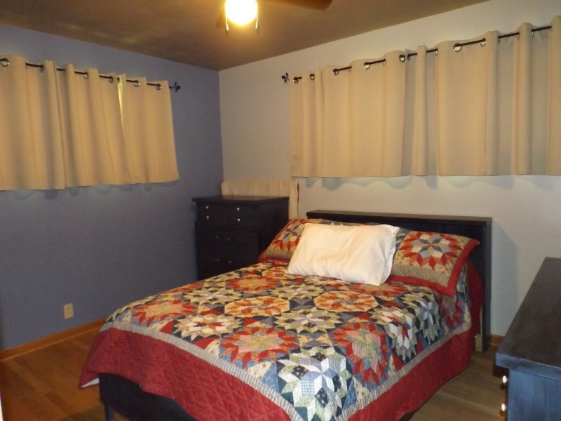 340 Tree Lane Prophetstown, IL 61277 - Photo 16 of 30 a bed sitting in a bedroom next to a window