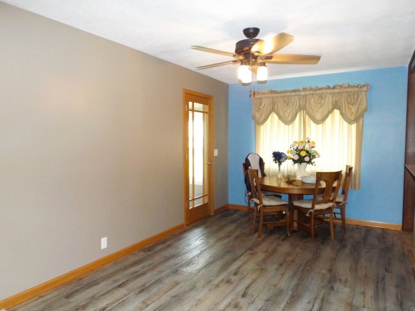 340 Tree Lane Prophetstown, IL 61277 - Photo 9 of 30 a view of a dining room with furniture window and wooden floor
