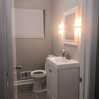 3439 West 84th Street Chicago, IL 60652 - Photo 17 of 32 a bathroom with a toilet sink and mirror