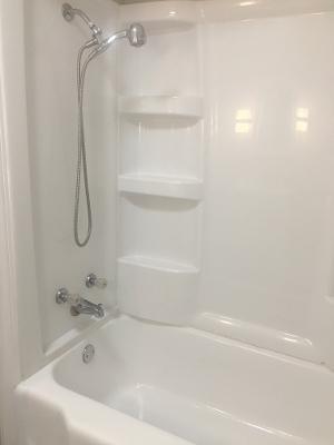 3439 West 84th Street Chicago, IL 60652 - Photo 18 of 32 a bathroom with a bath tub with a shower