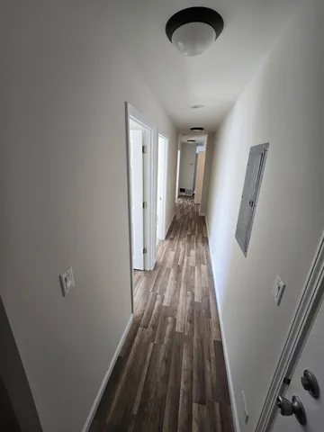 a view of entryway with wooden floor