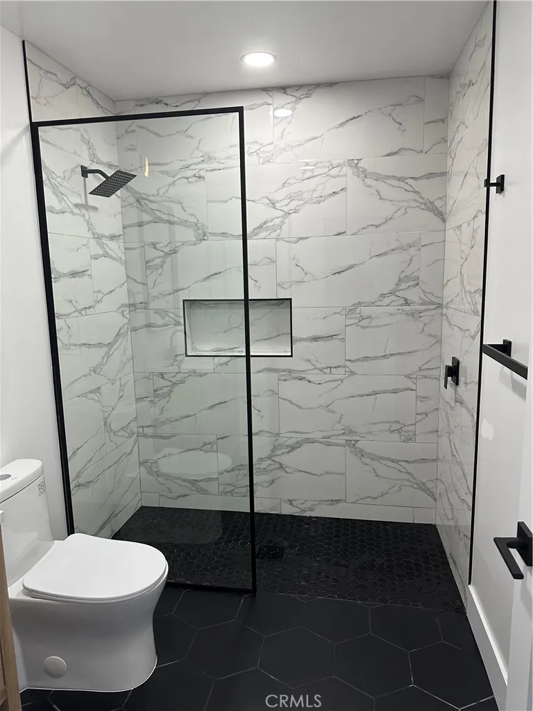 632 Truly Vista, Unit 634 Vista, CA 92084 - Photo 66 of 73 a bathroom with a toilet and a shower