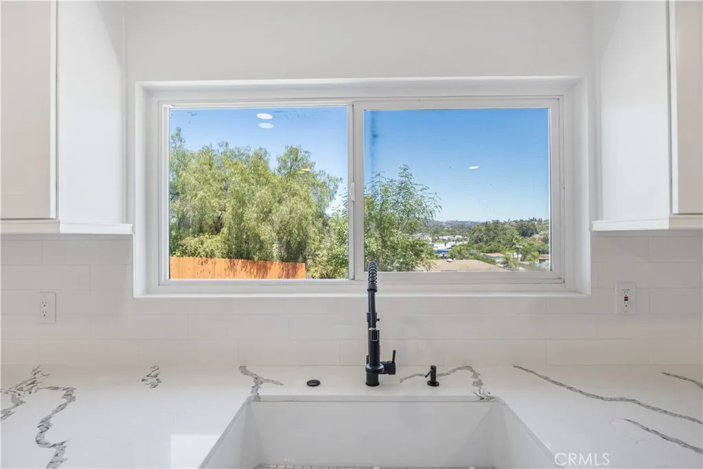 632 Truly Vista, Unit 634 Vista, CA 92084 - Photo 8 of 73 a bathroom with a bathtub and window