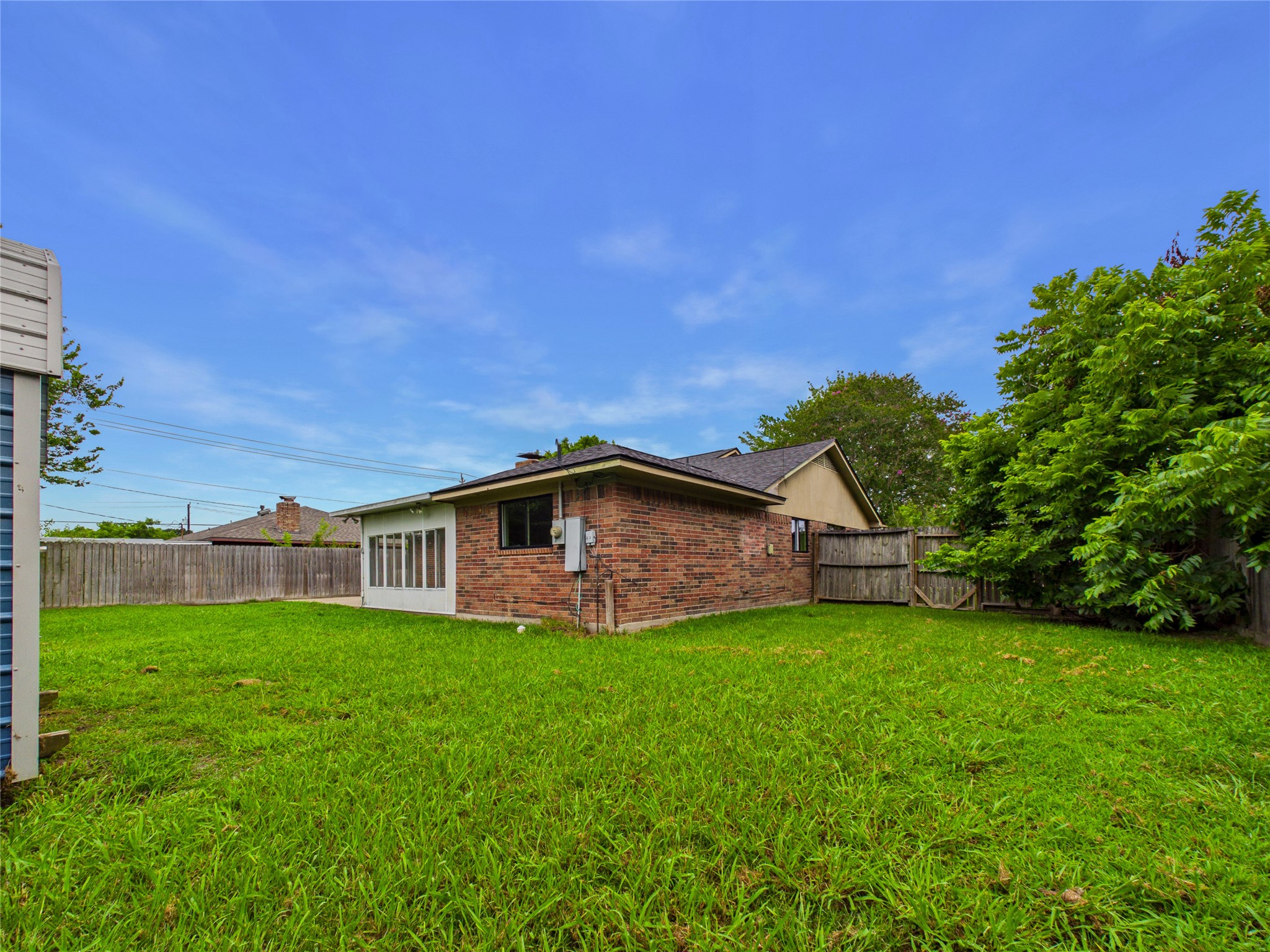 10306 Rustic Rock Road La Porte, TX 77571 - Photo 37 of 38 a view of a house with a yard and sitting area