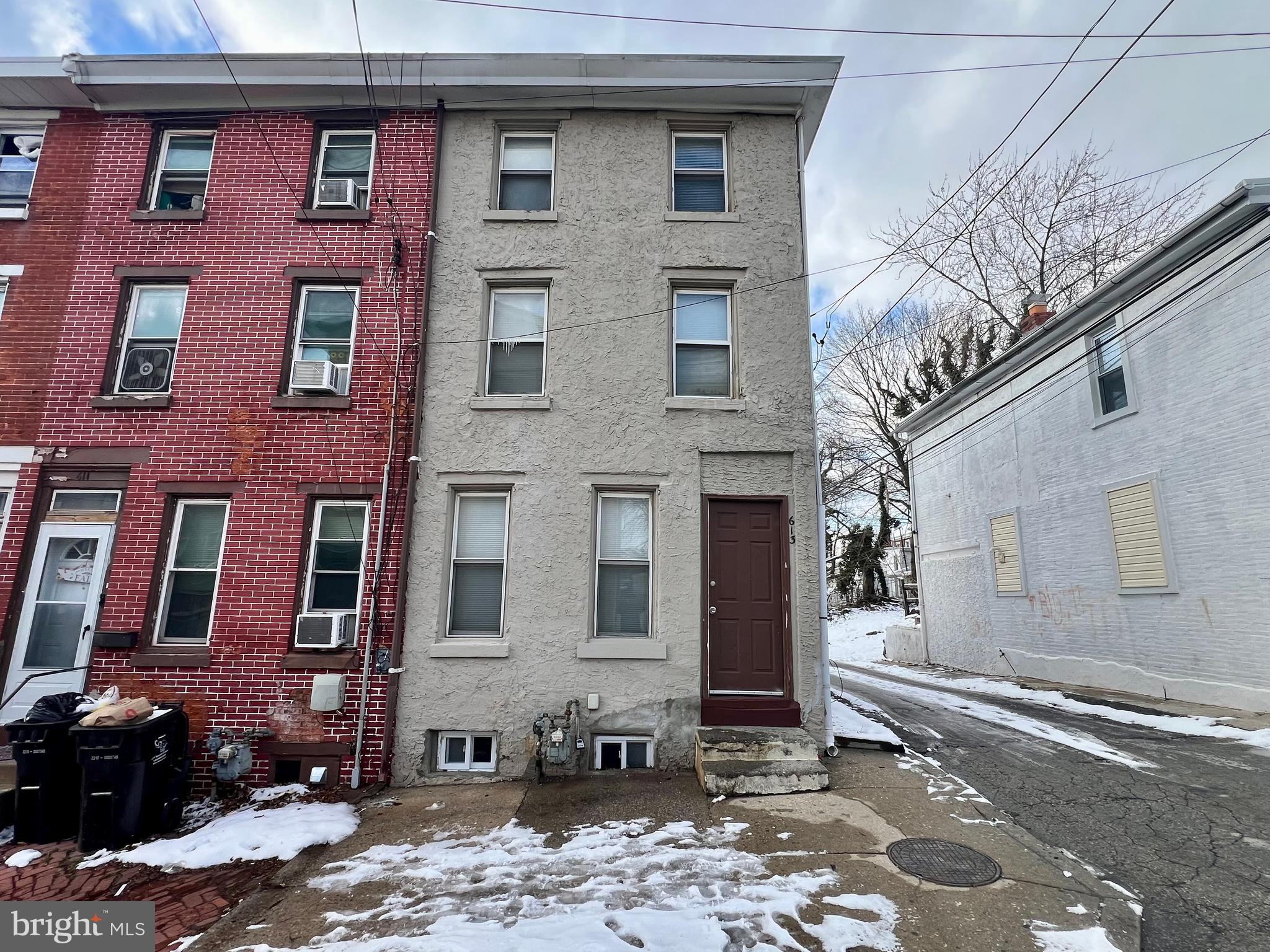 613 Walnut Street Norristown, PA 19401 - Photo 1 of 22 a brick building with a large windows