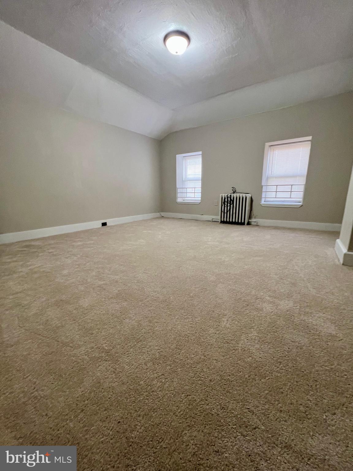 613 Walnut Street Norristown, PA 19401 - Photo 12 of 22 a view of an empty room with a window