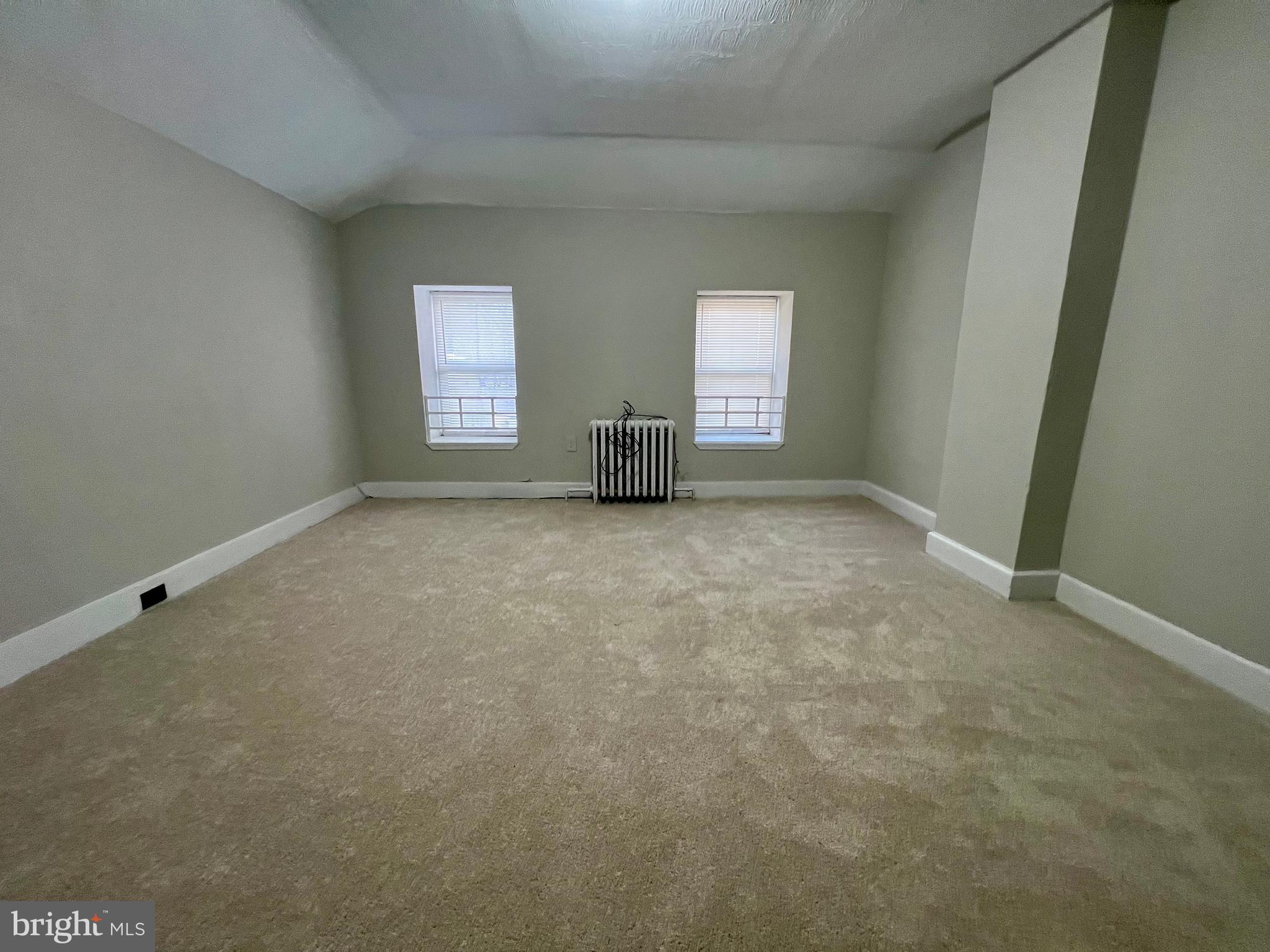 613 Walnut Street Norristown, PA 19401 - Photo 13 of 22 an empty room with a window