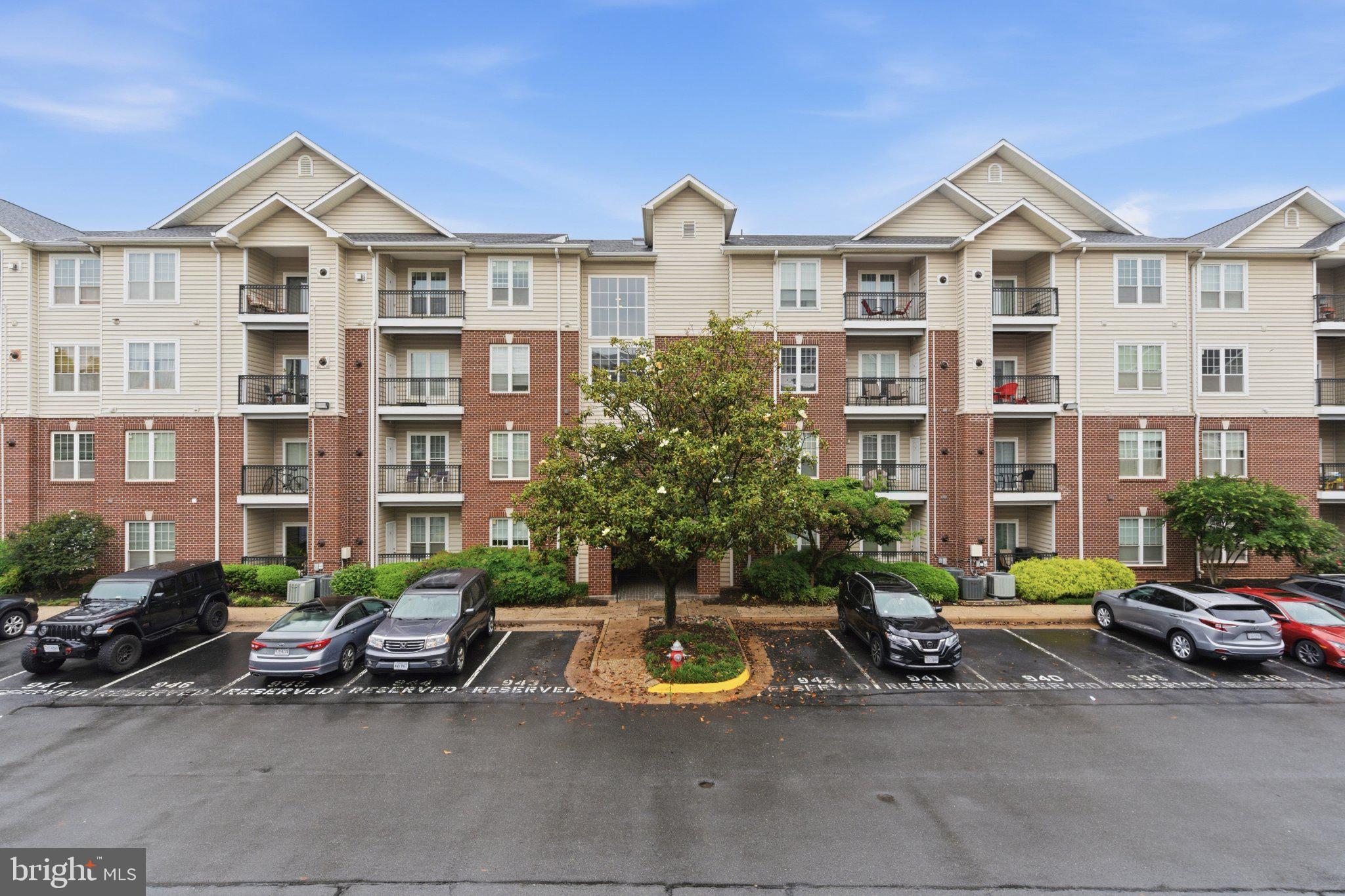 1580 Spring Gate Dr., Unit 4303 McLean, VA 22102 - Photo 35 of 41 Charming apartment complex with greenery.