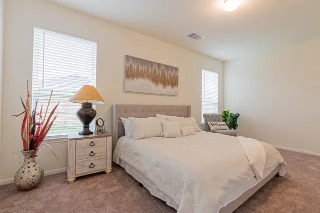 a view of a livingroom with furniture