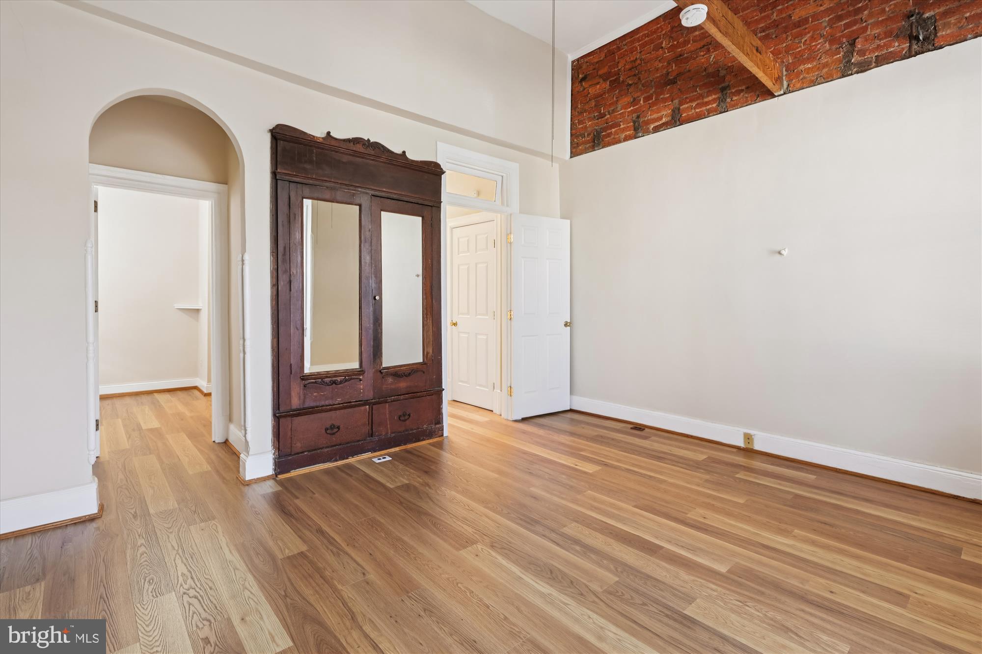 14 Seaton Place Northwest Washington, DC 20001 - Photo 26 of 46 wooden floor in an empty room with a window