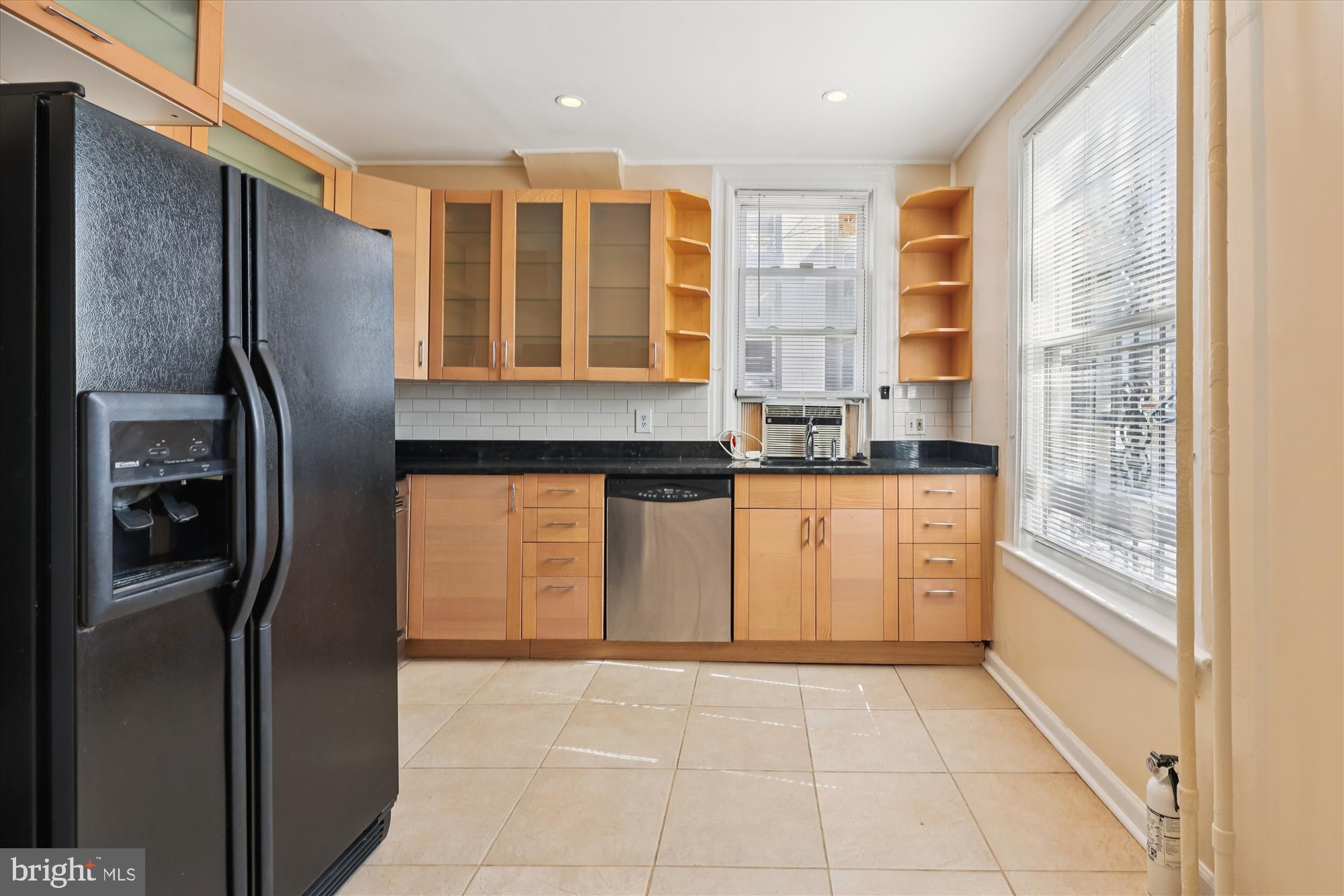 14 Seaton Place Northwest Washington, DC 20001 - Photo 5 of 46 a kitchen with stainless steel appliances granite countertop a refrigerator and a sink