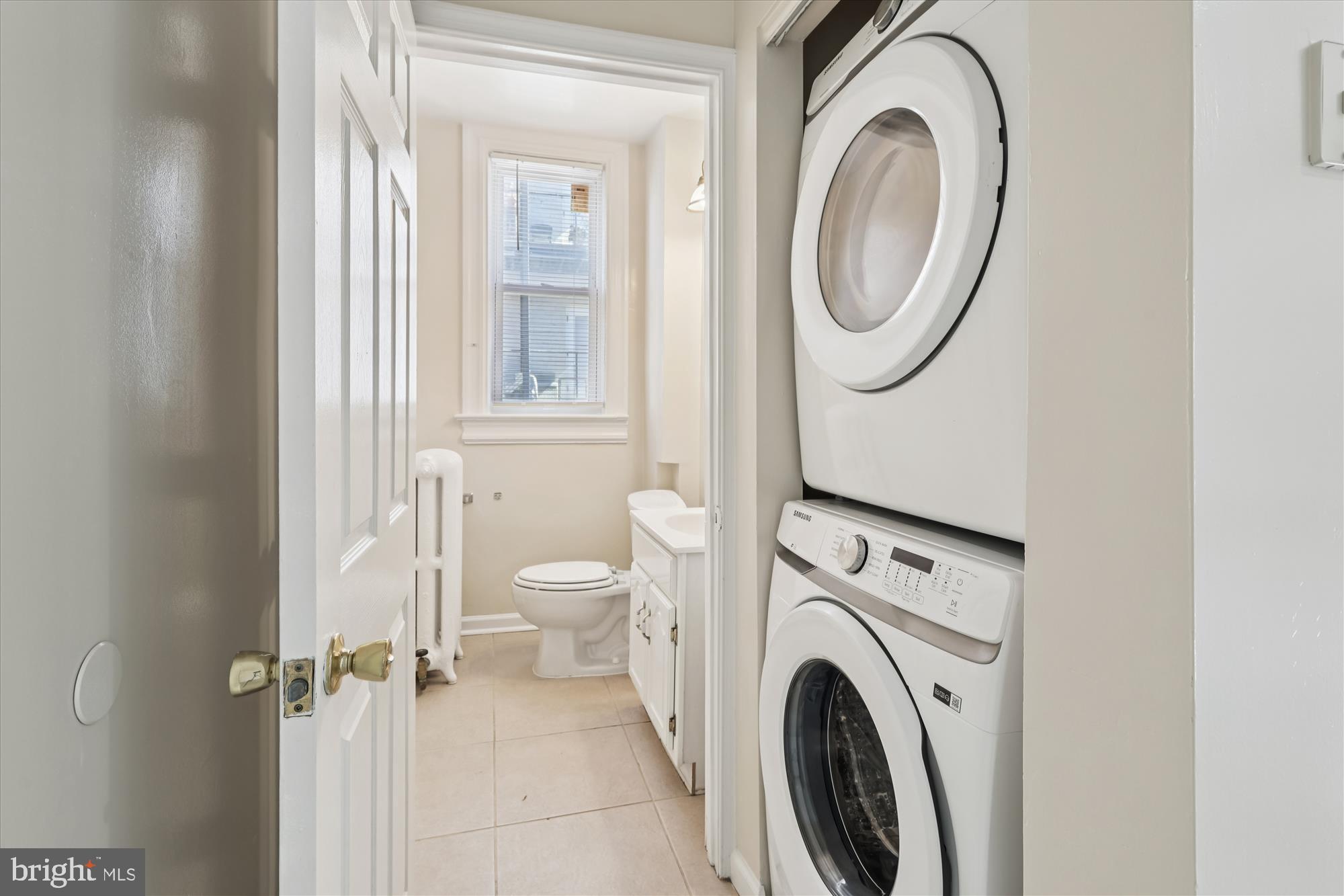 14 Seaton Place Northwest Washington, DC 20001 - Photo 9 of 46 a view of a bathroom with a washer and dryer