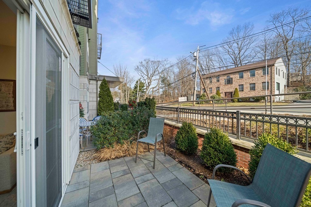 200 Revere Street, Unit 4103 Canton, MA 02021 - Photo 21 of 39 a view of a building from a balcony