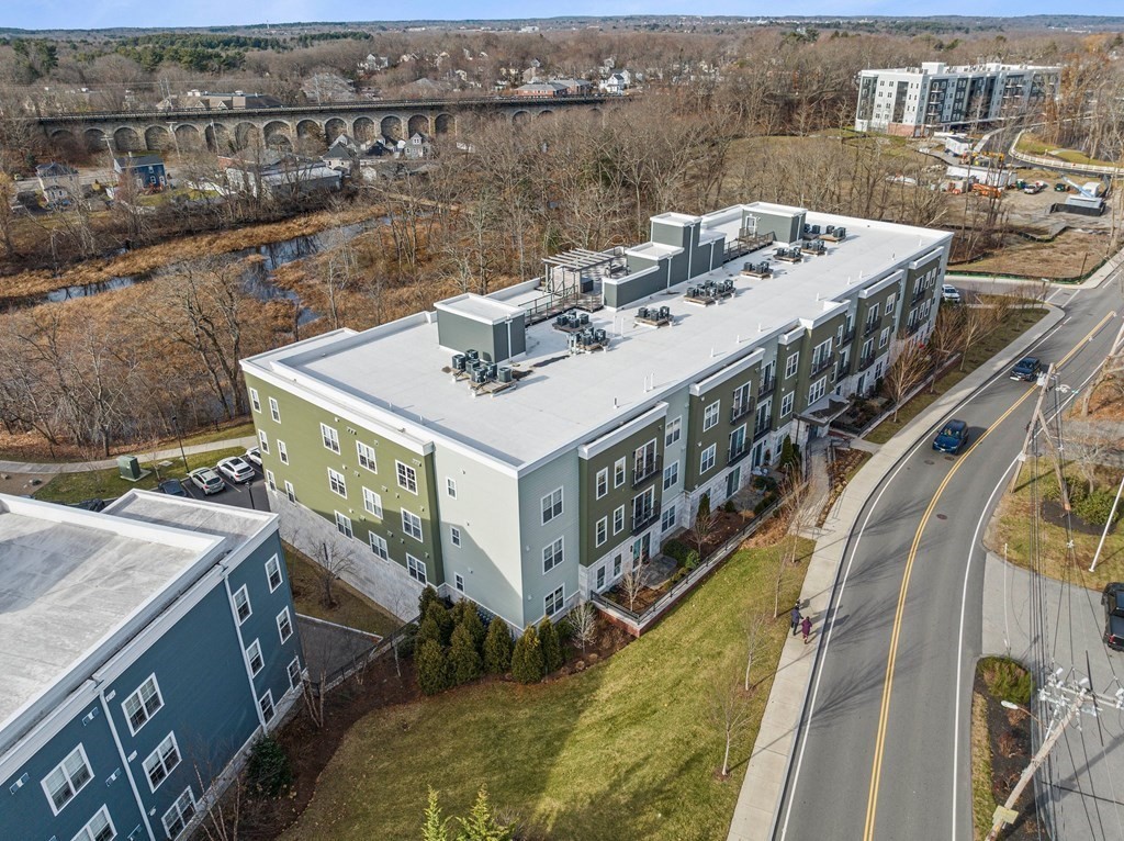 200 Revere Street, Unit 4103 Canton, MA 02021 - Photo 28 of 39 a view of a balcony with furniture