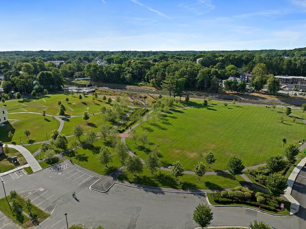 200 Revere Street, Unit 4103 Canton, MA 02021 - Photo 35 of 39 a view of a garden with lawn chairs