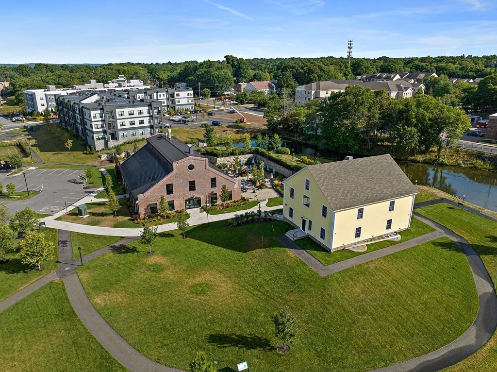 200 Revere Street, Unit 4103 Canton, MA 02021 - Photo 37 of 39 an aerial view of residential houses with outdoor space and trees