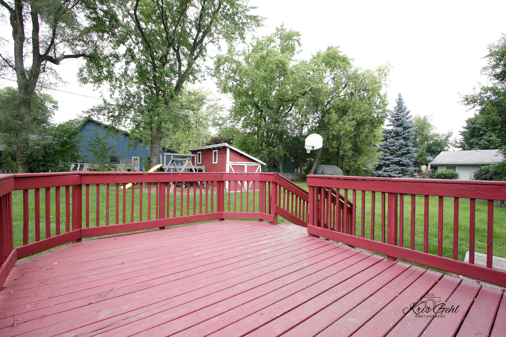 1038 Ferndale Street Gurnee, IL 60031 - Photo 18 of 24 a view of wooden deck and a garden