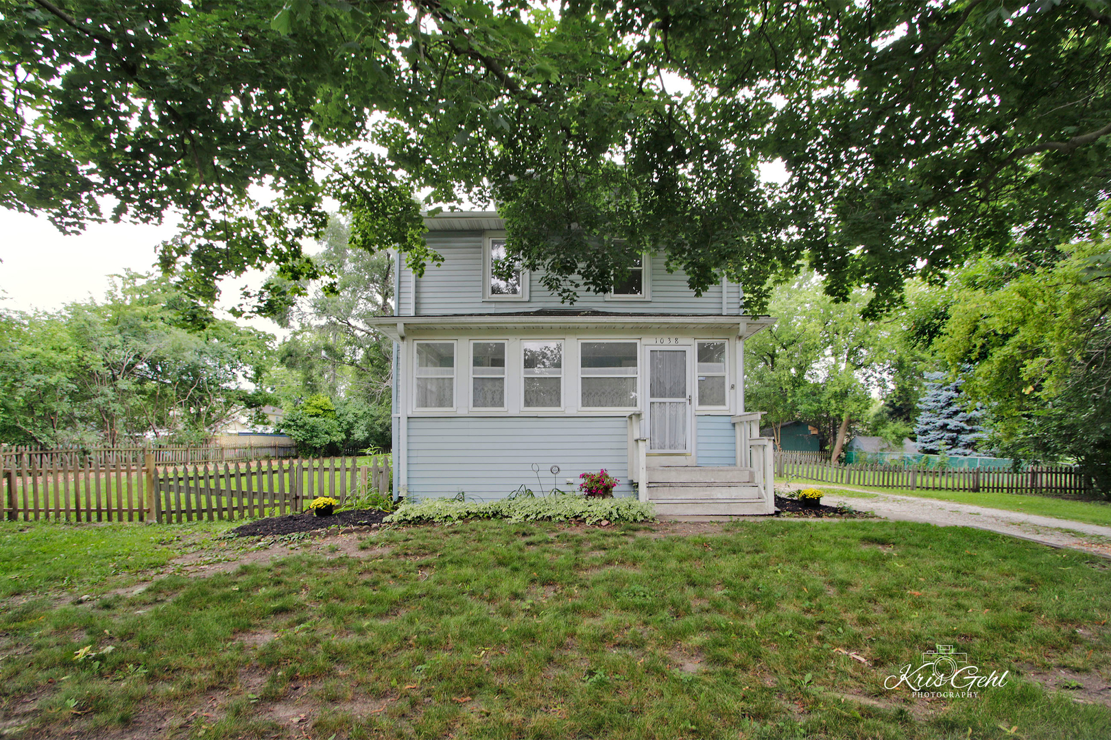 1038 Ferndale Street Gurnee, IL 60031 - Photo 2 of 24 a front view of a house with a yard