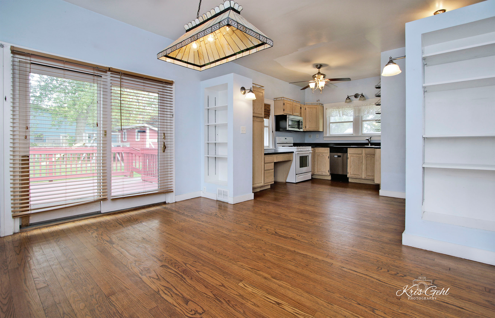 1038 Ferndale Street Gurnee, IL 60031 - Photo 5 of 24 a view of a kitchen with furniture and wooden floor