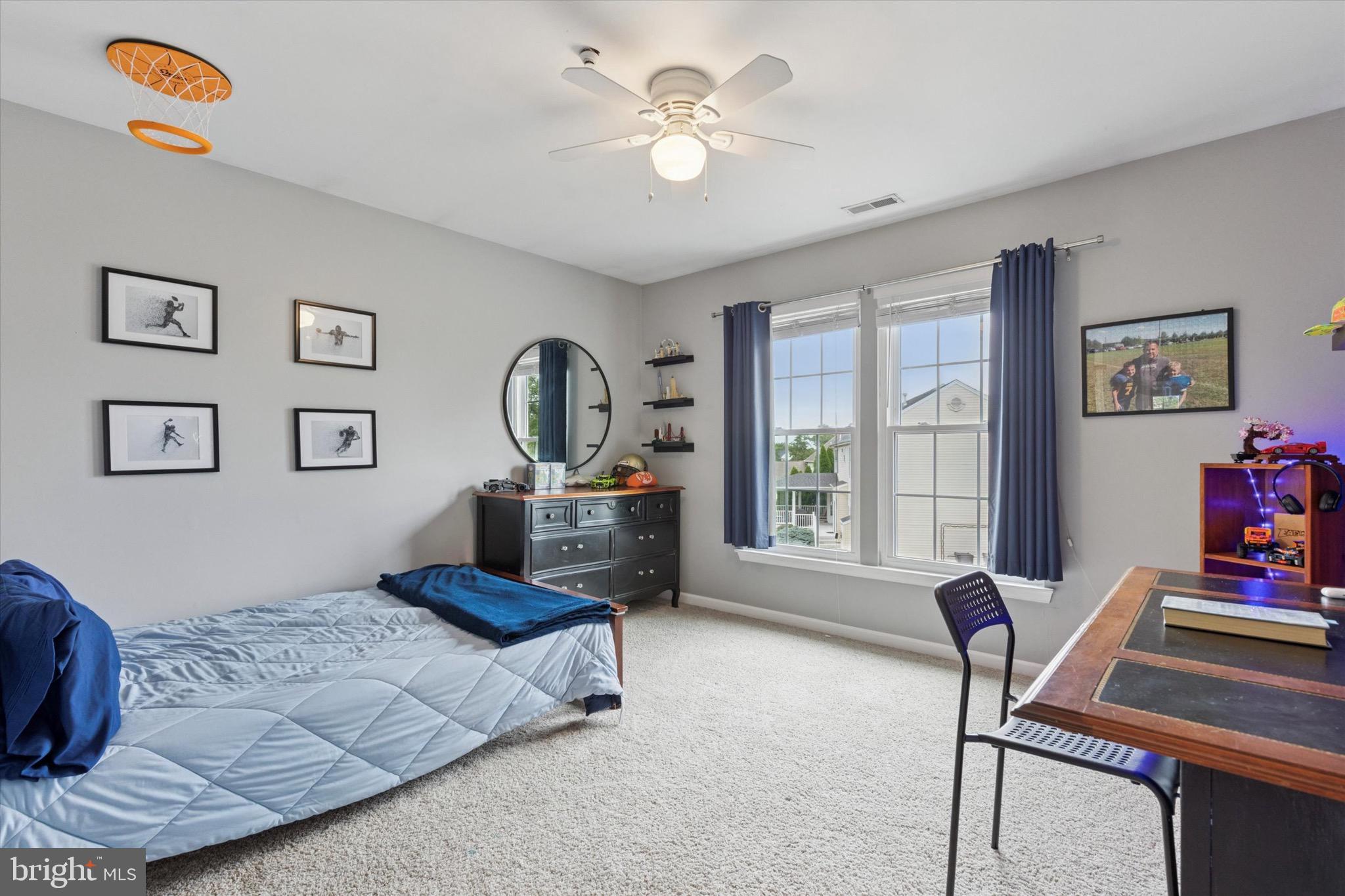 803 Sweet Cherry Street Warrington, PA 18976 - Photo 12 of 35 a bedroom with furniture and a window