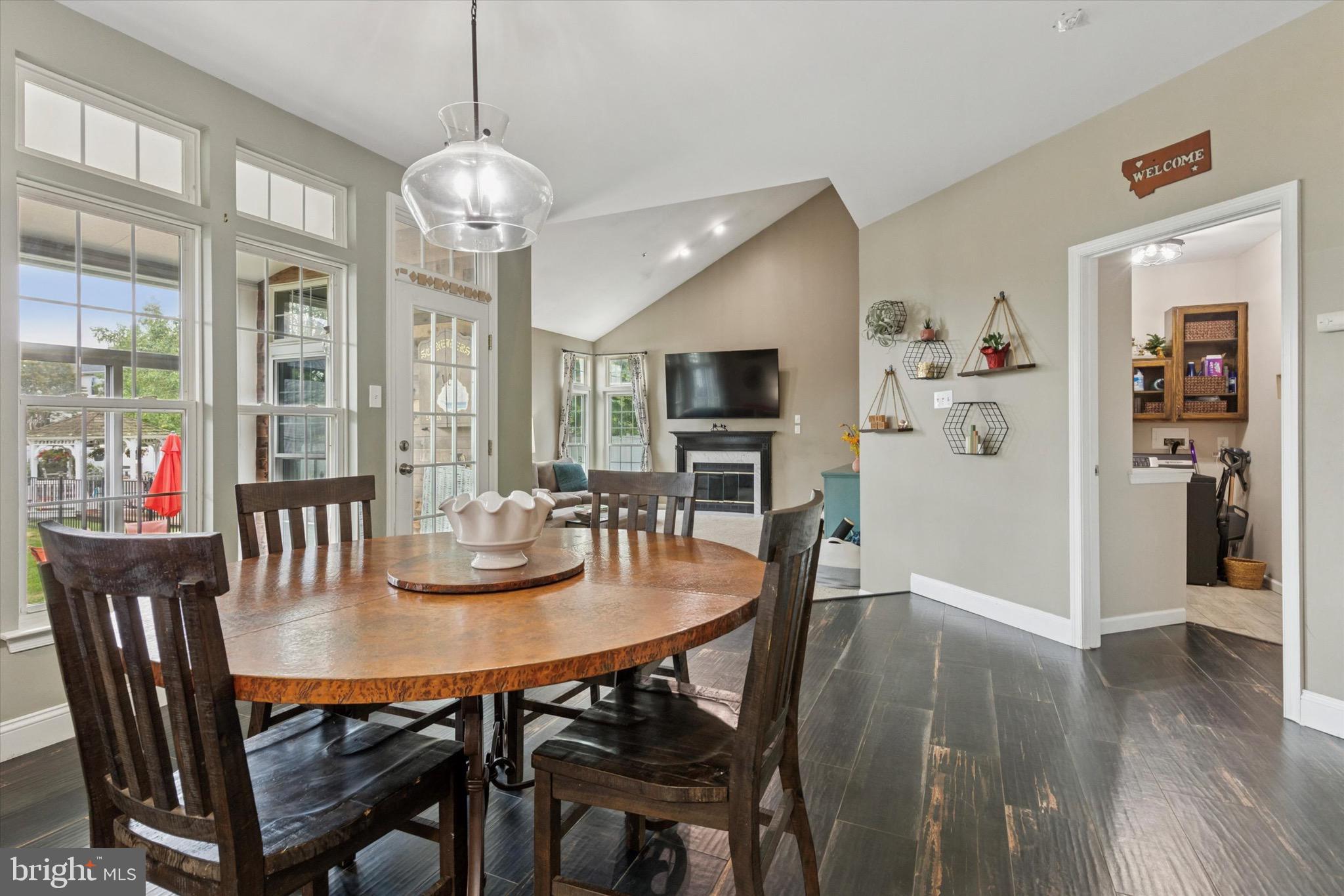 803 Sweet Cherry Street Warrington, PA 18976 - Photo 18 of 35 a dining room with furniture window and wooden floor