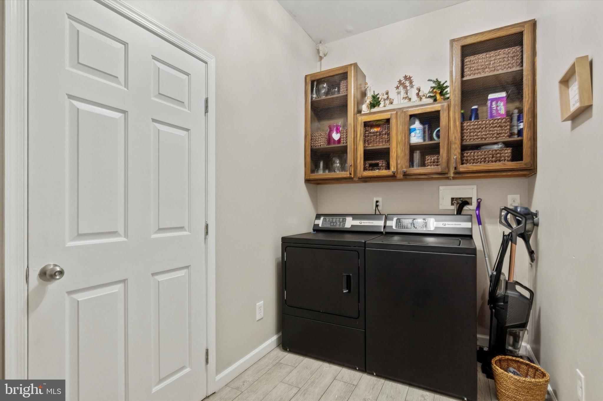 803 Sweet Cherry Street Warrington, PA 18976 - Photo 21 of 35 a kitchen with stainless steel appliances granite countertop a stove and a refrigerator