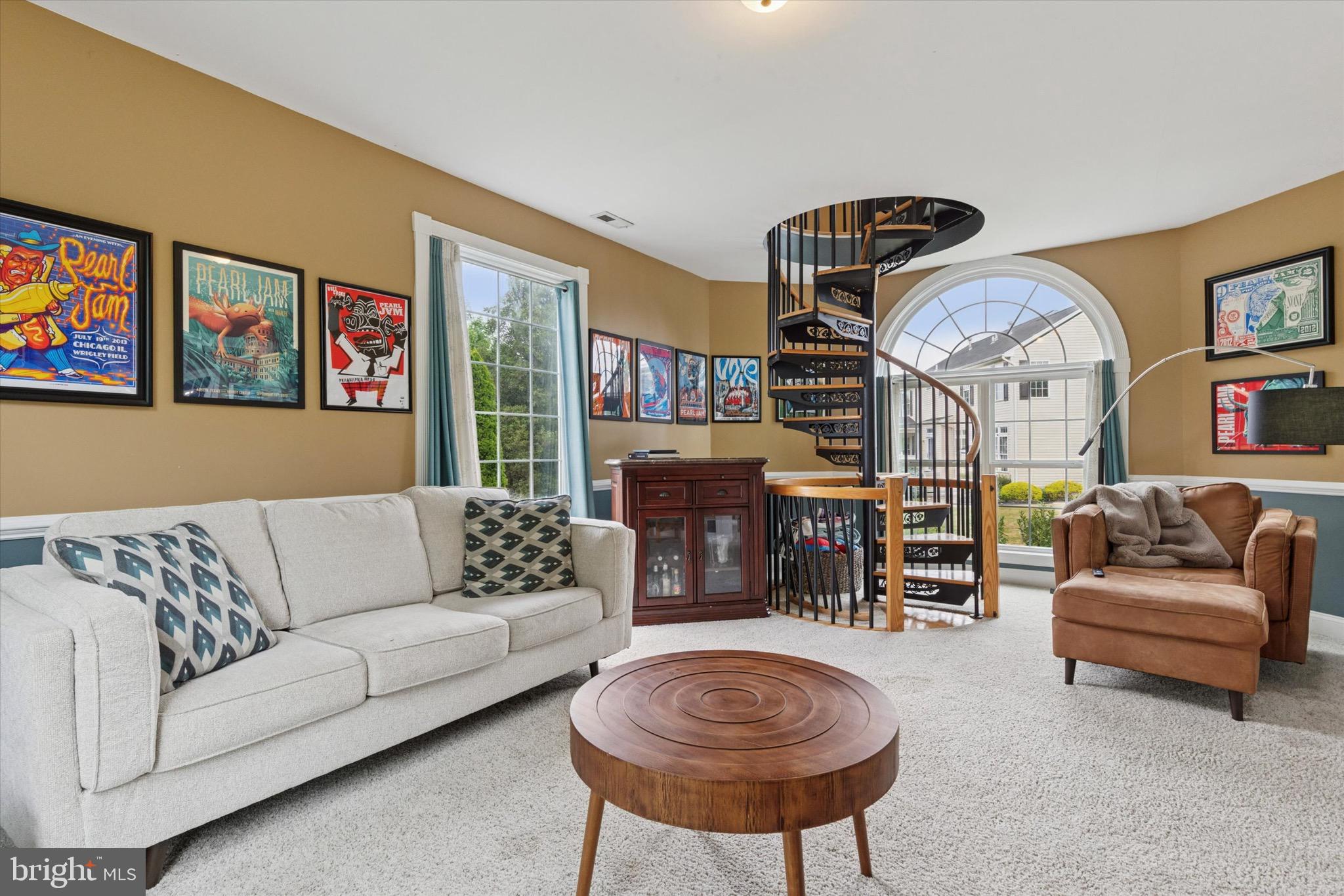 803 Sweet Cherry Street Warrington, PA 18976 - Photo 24 of 35 a living room with furniture a couch and a chandelier