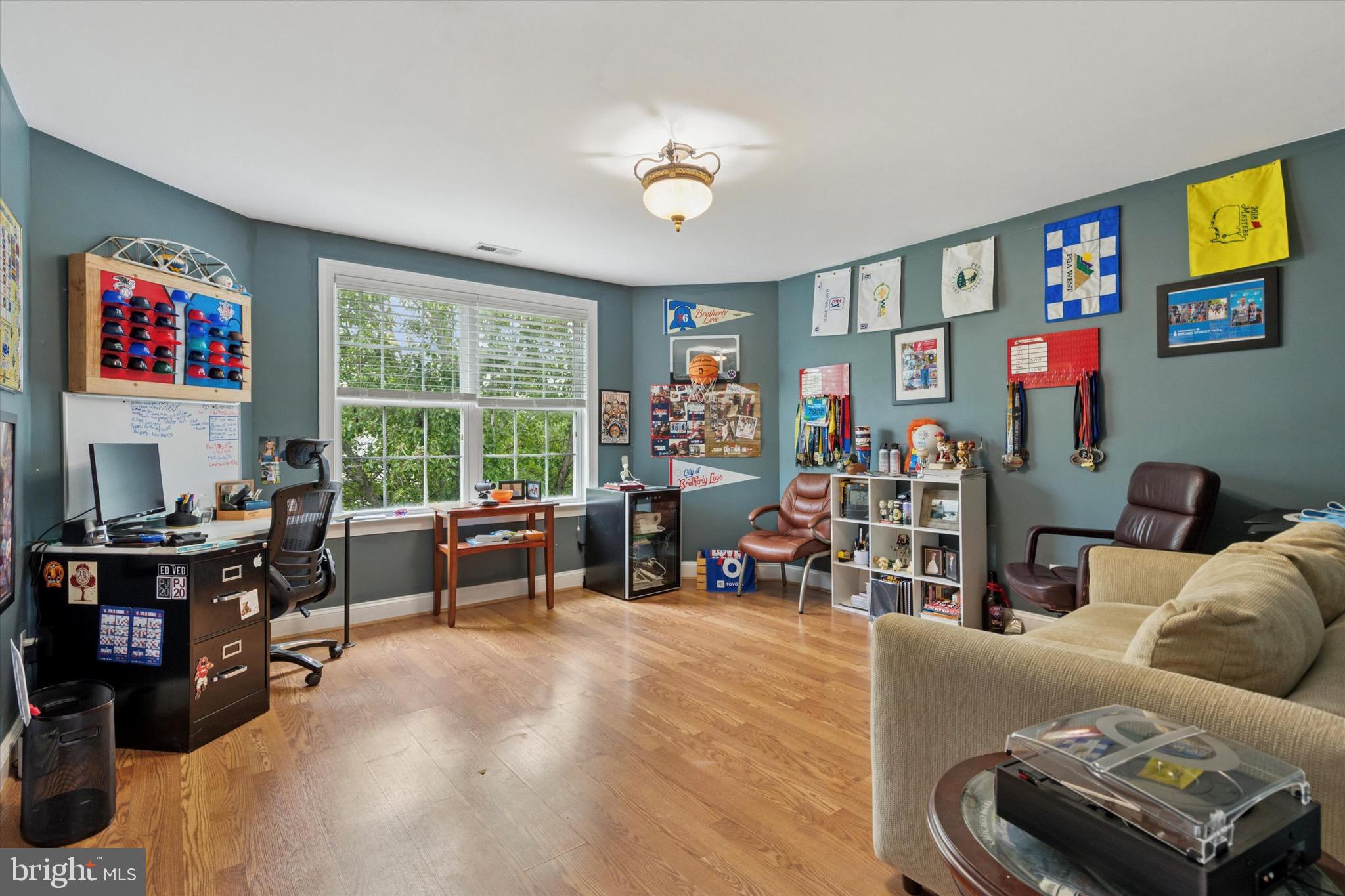 803 Sweet Cherry Street Warrington, PA 18976 - Photo 26 of 35 a living room with furniture and a flat screen tv