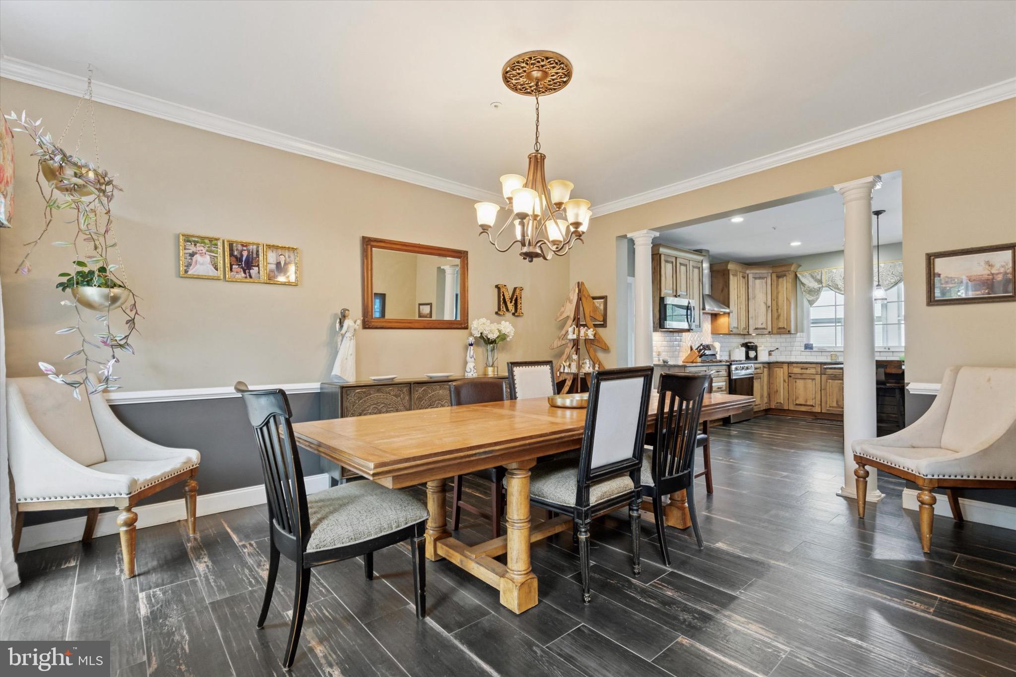 803 Sweet Cherry Street Warrington, PA 18976 - Photo 6 of 35 a view of a dining room with furniture and wooden floor