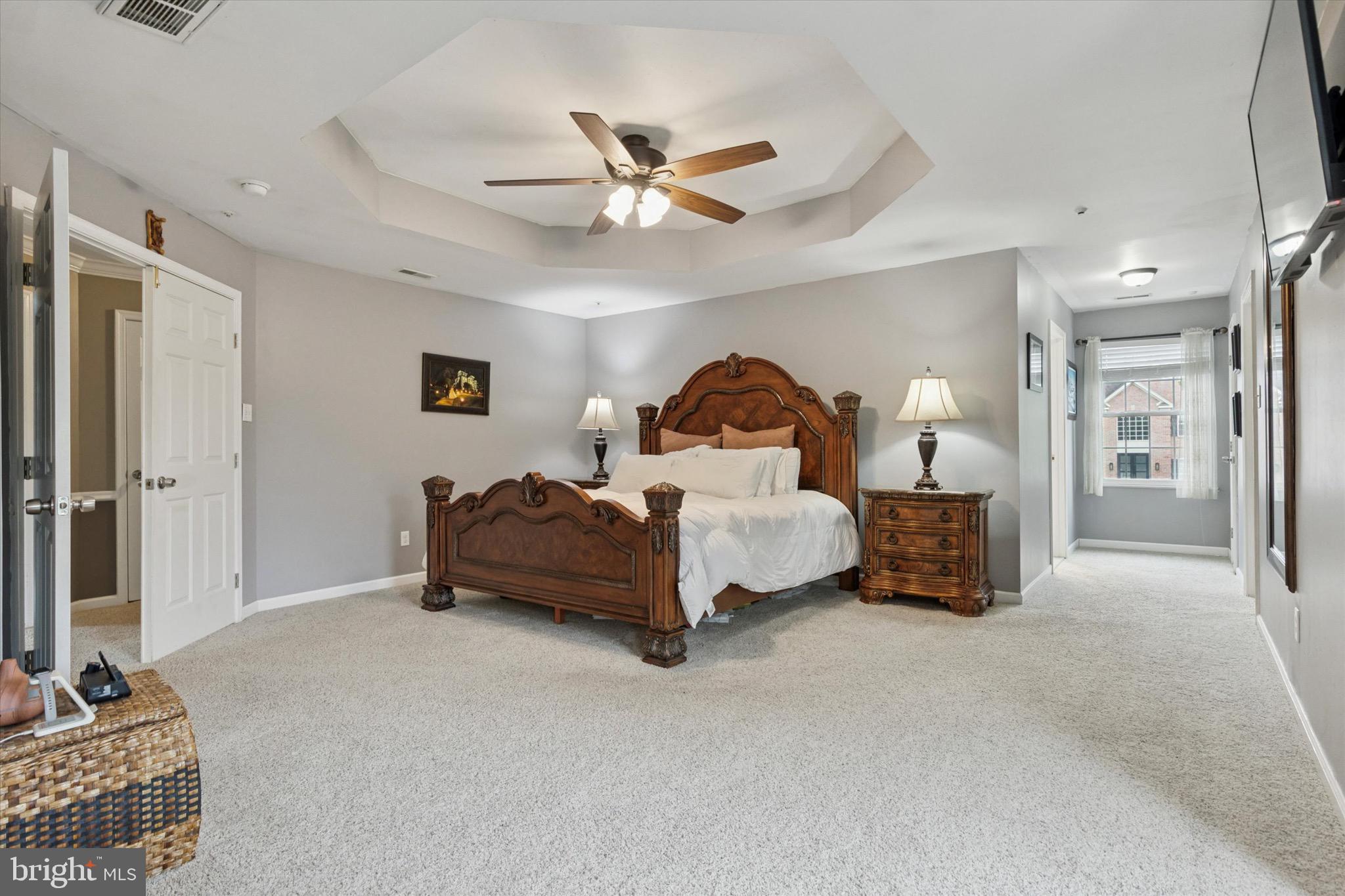 803 Sweet Cherry Street Warrington, PA 18976 - Photo 7 of 35 a spacious bedroom with a bed and ceiling fan