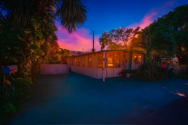 a view of a backyard of a house