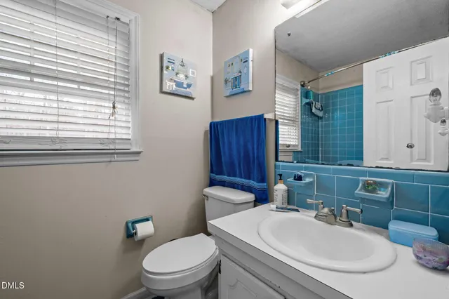 a view of an empty room with a closet