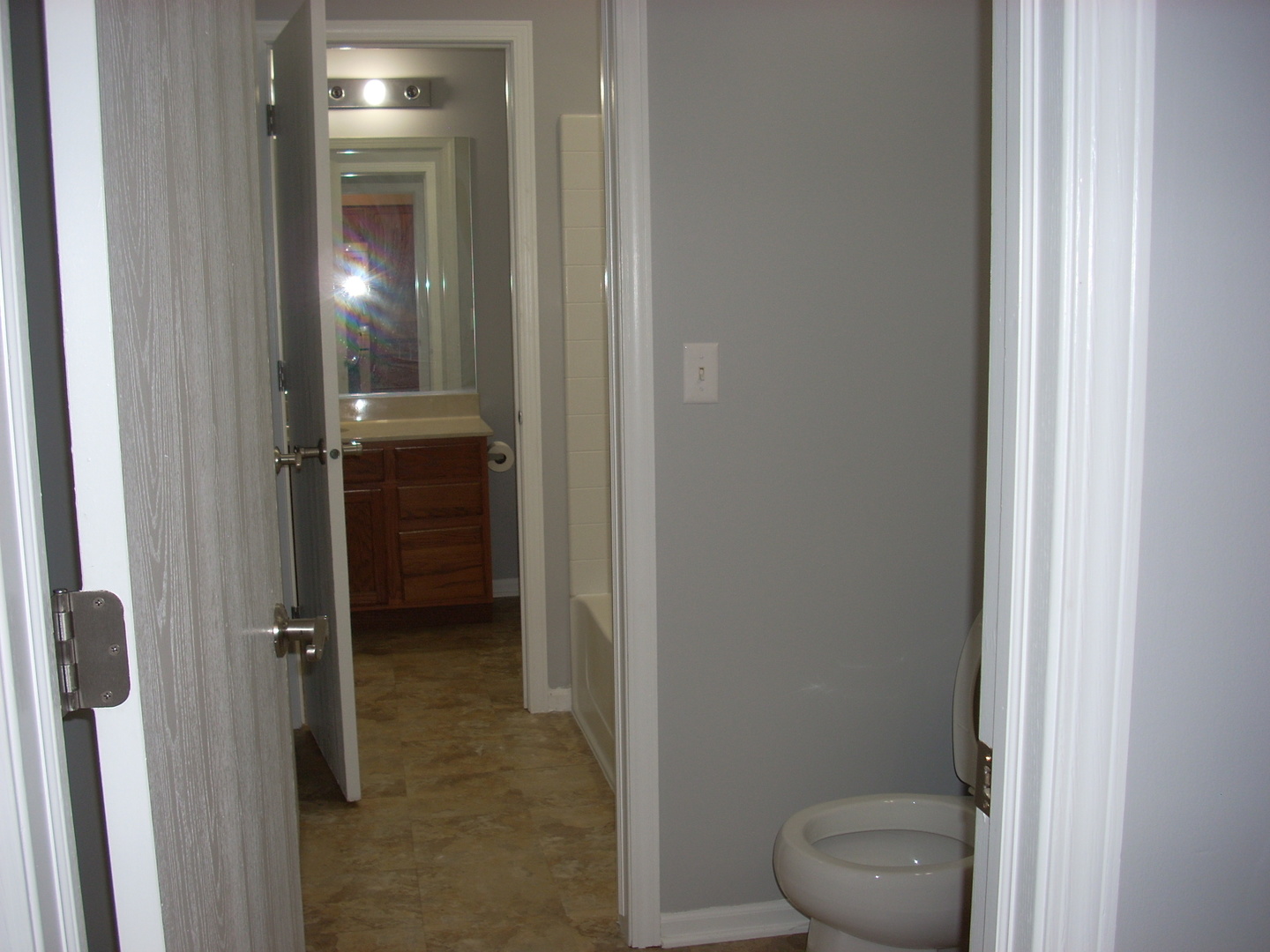 3305 Paige Street Plano, IL 60545 - Photo 17 of 20 a bathroom with a granite countertop toilet
