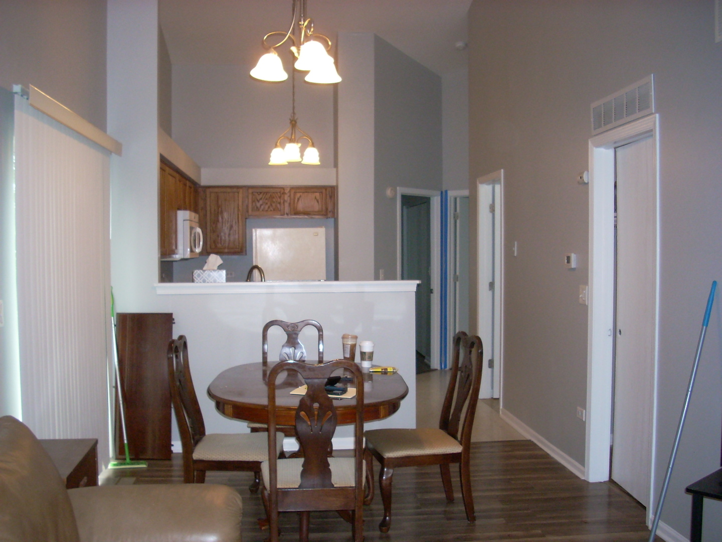 3305 Paige Street Plano, IL 60545 - Photo 6 of 20 a view of a dining room with furniture and wooden floor
