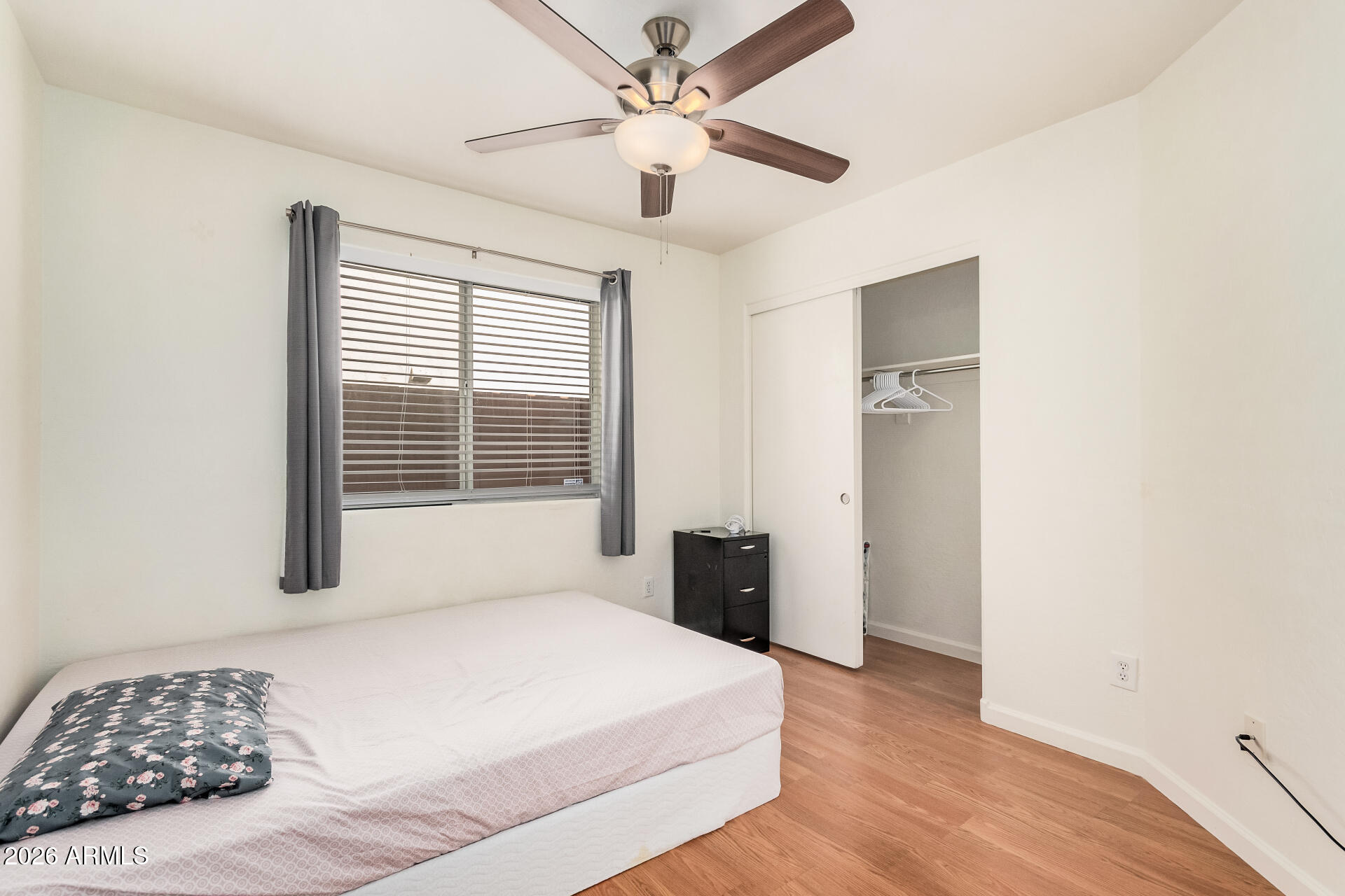 17433 North 20th Street Phoenix, AZ 85022 - Photo 24 of 29 a bedroom with a bed and a window