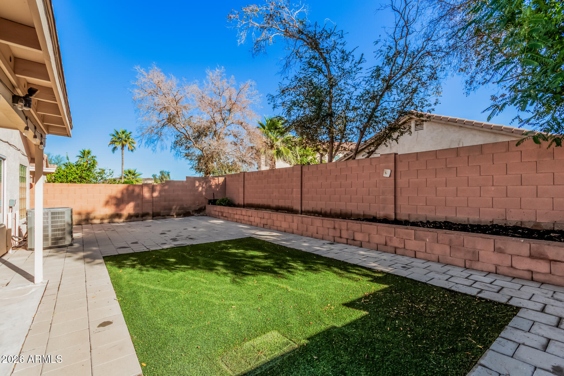 17433 North 20th Street Phoenix, AZ 85022 - Photo 27 of 29 a backyard of a house with lots of green space