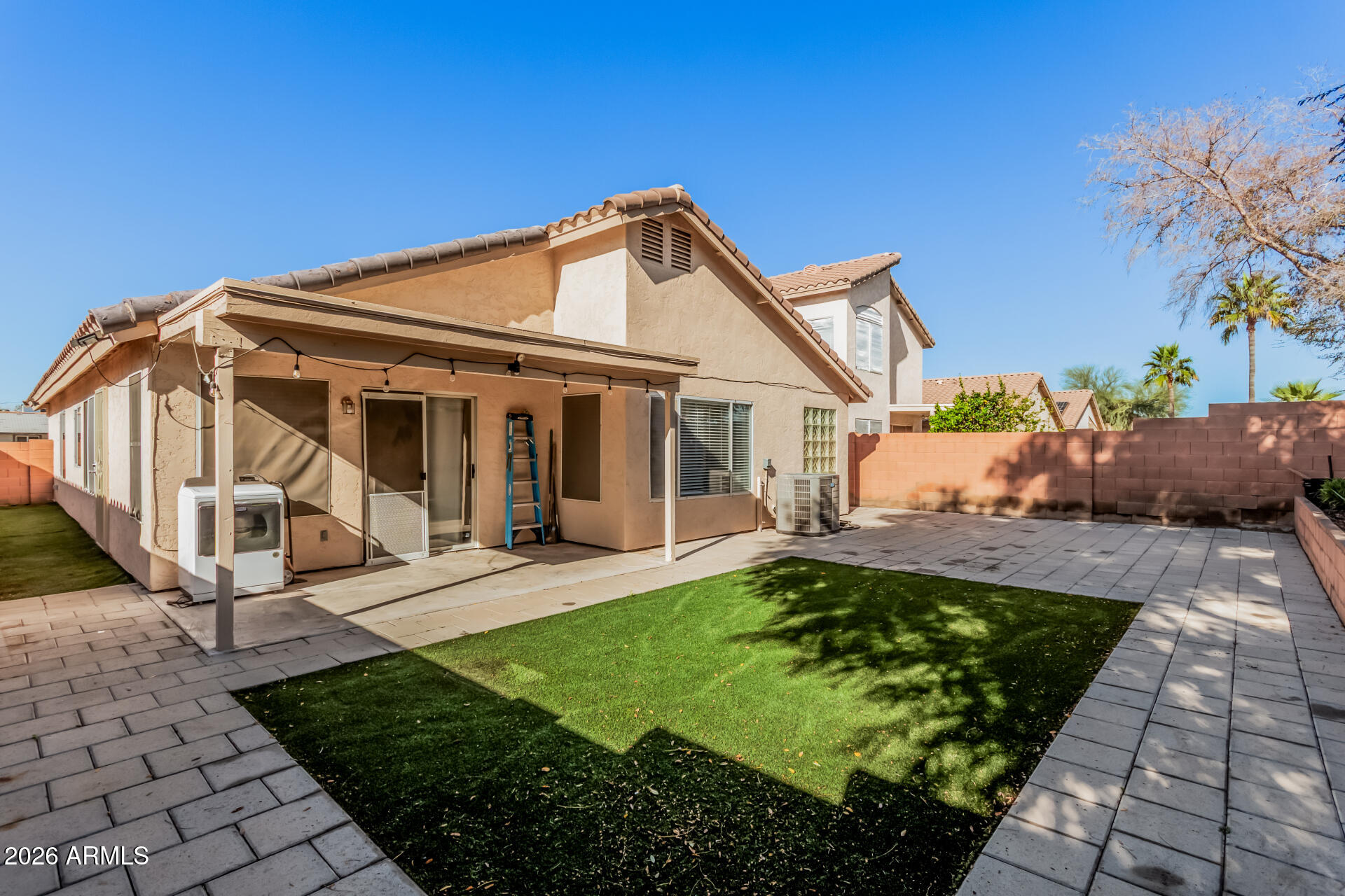 17433 North 20th Street Phoenix, AZ 85022 - Photo 29 of 29 a view of a house with backyard sitting area and garden