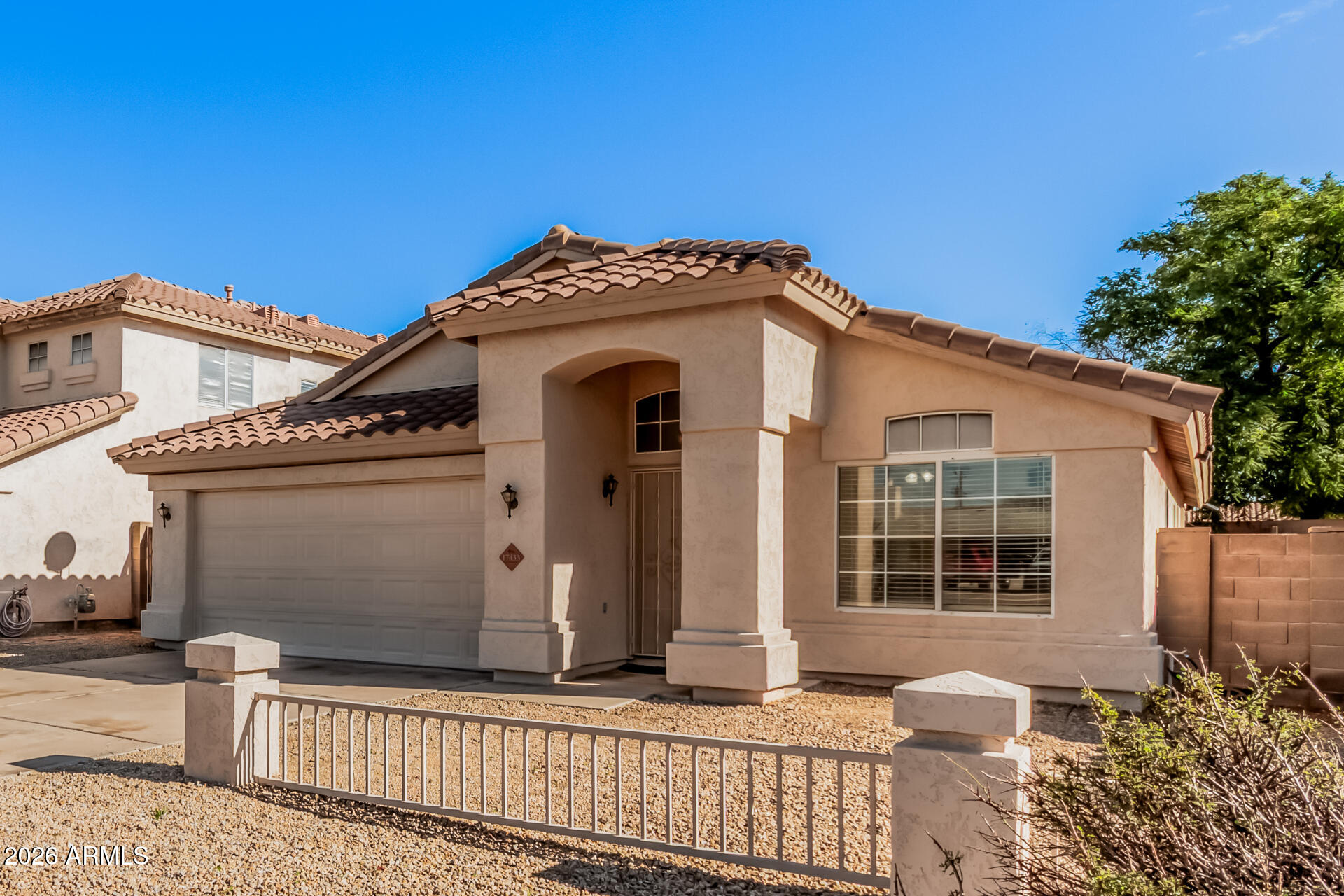 17433 North 20th Street Phoenix, AZ 85022 - Photo 4 of 29 a front view of a house with a porch