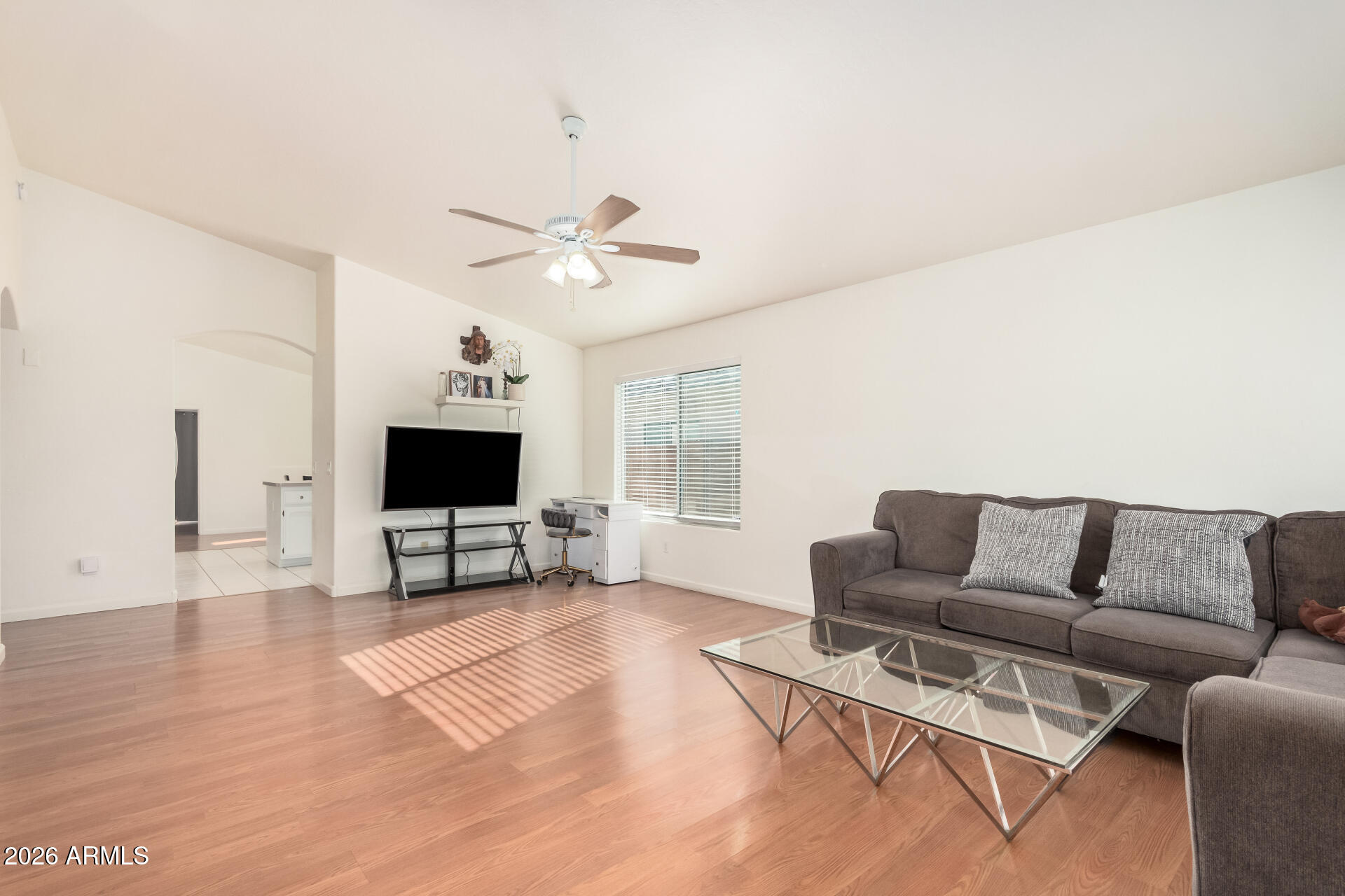 17433 North 20th Street Phoenix, AZ 85022 - Photo 7 of 29 a living room with furniture and a flat screen tv