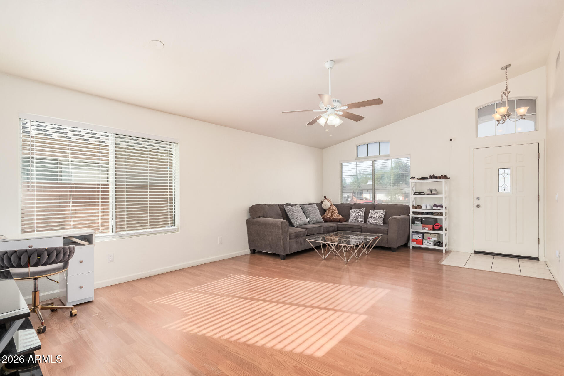 17433 North 20th Street Phoenix, AZ 85022 - Photo 8 of 29 a living room with furniture and a large window