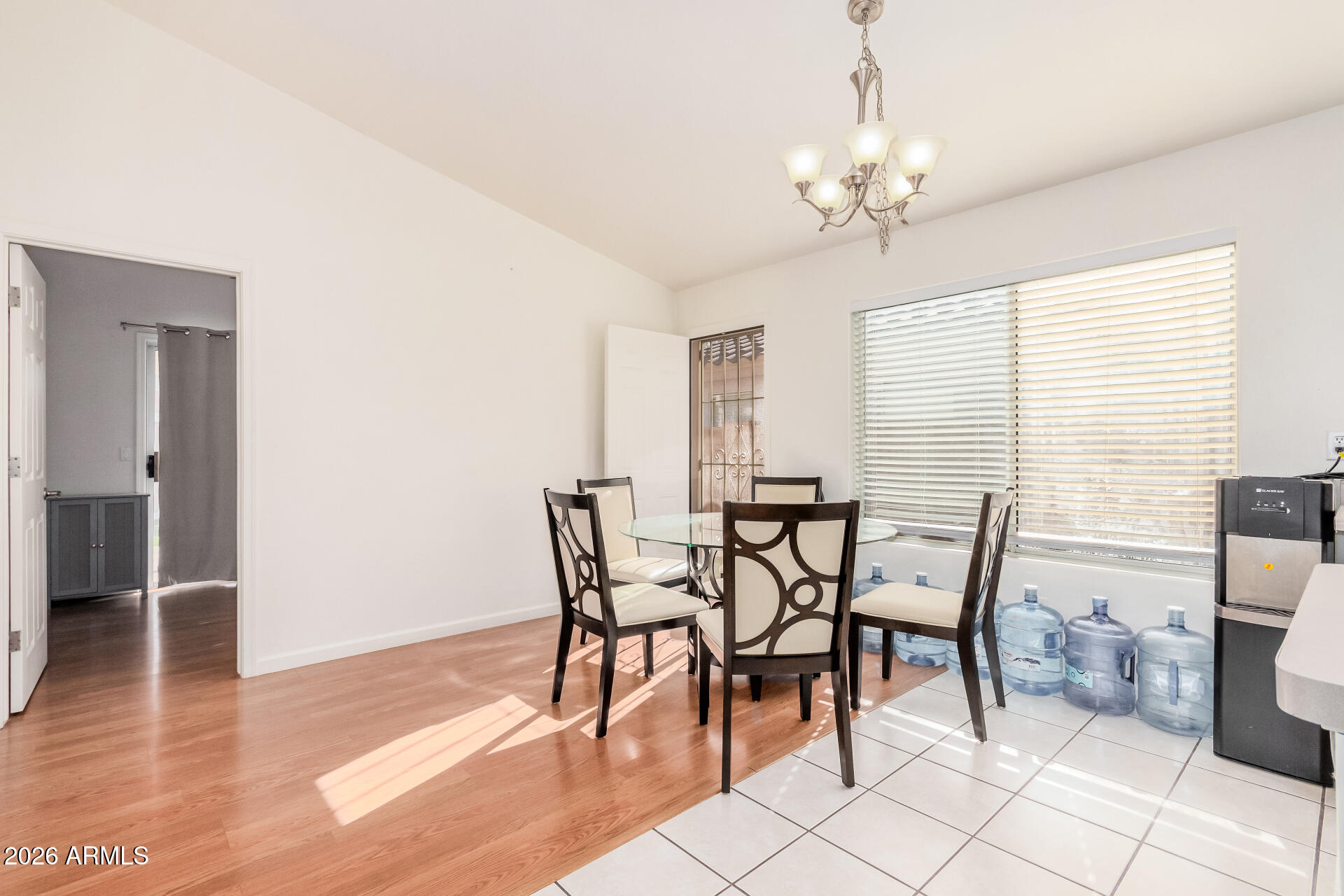 17433 North 20th Street Phoenix, AZ 85022 - Photo 10 of 29 a view of a dining room with furniture and wooden floor